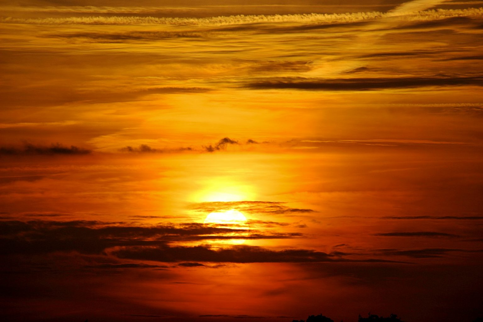 Sunset amid dark clouds